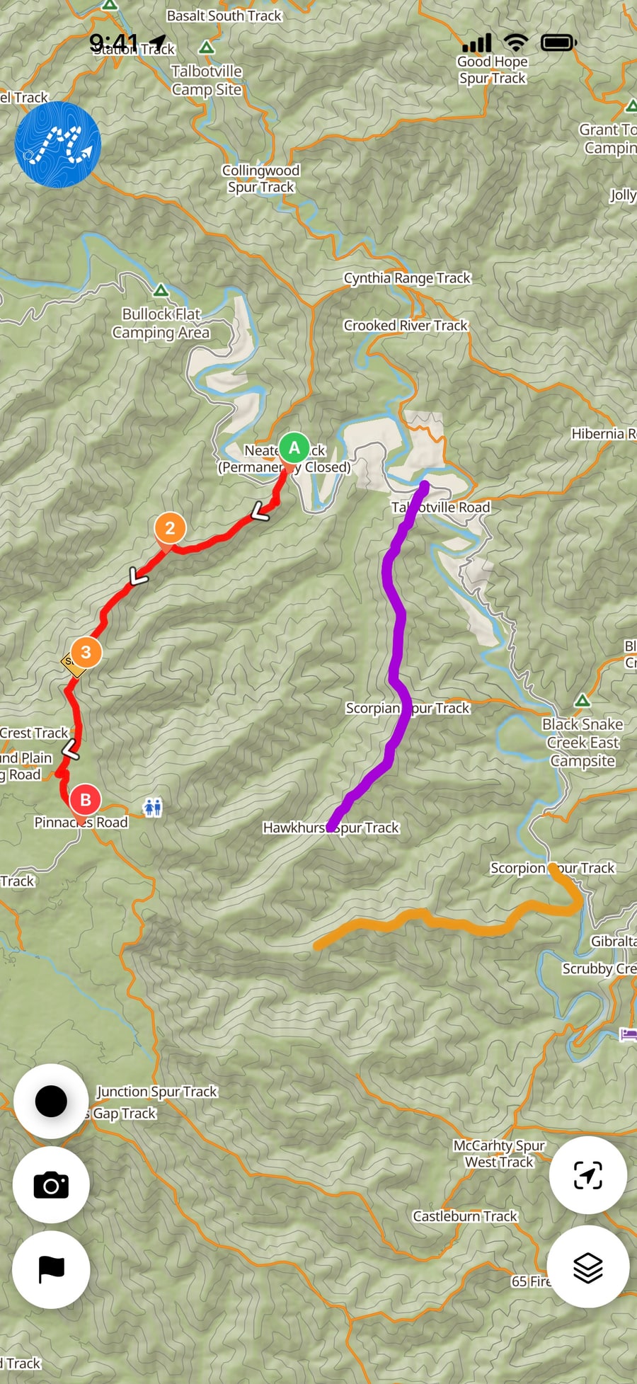 Imported routes and trips on the map in Dirt Map: a route with its waypoints, and recorded trips in their own colours.