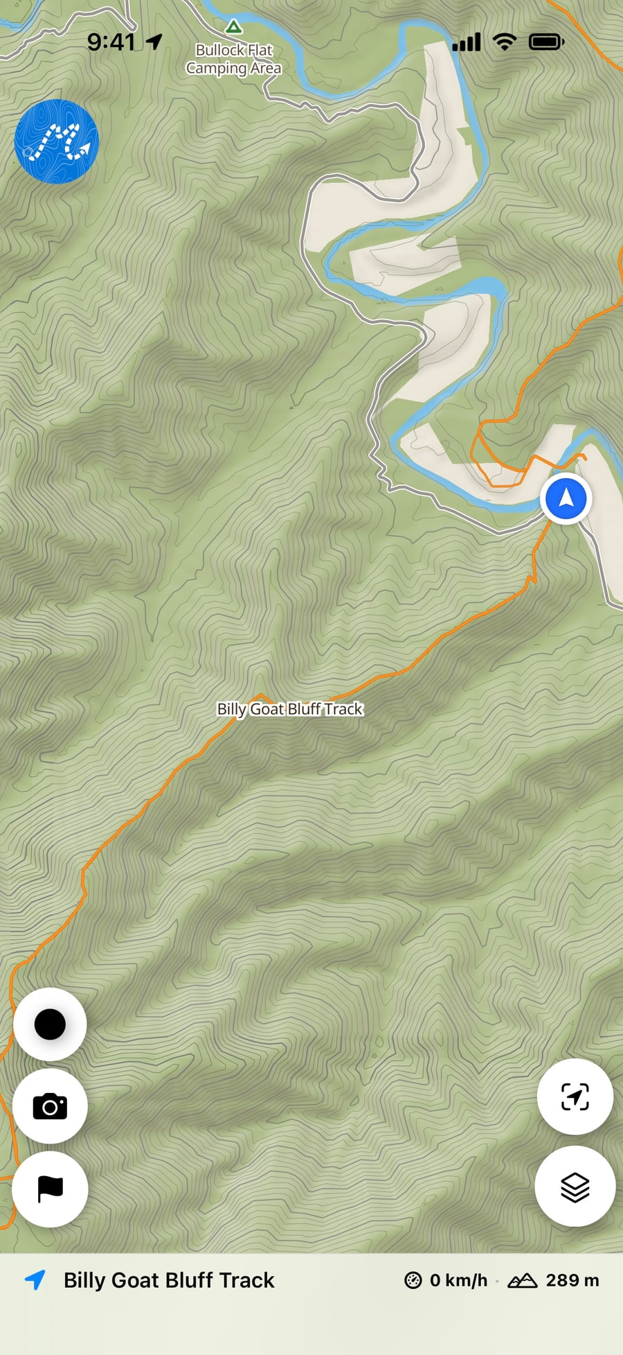 The Dirt Map map in steep country, with 4WD tracks in orange, a track name, a camp site and your position.