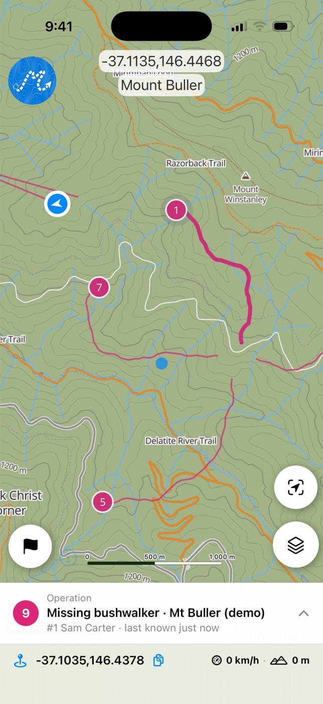 The searcher’s iPhone in the same operation, showing their teammates and trails on the map.