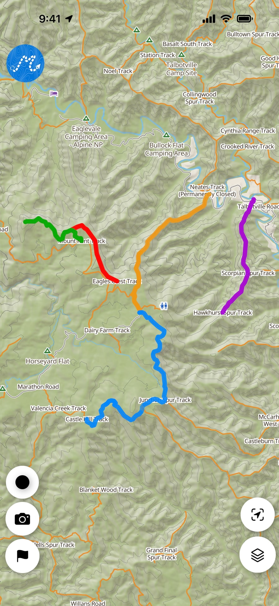 Several recorded trips on the map in Dirt Map, each in its own colour.