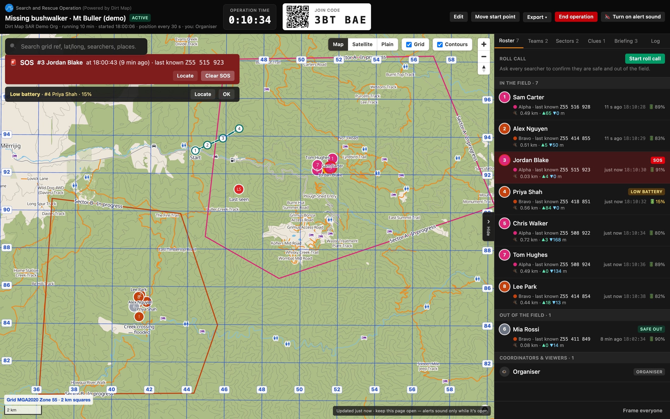 The Dirt Map SAR coordinator board: a topographic map with the MGA2020 grid, two search sectors, numbered searchers in team colours, an SOS banner, and a roster listing each searcher’s grid reference, last update and battery.